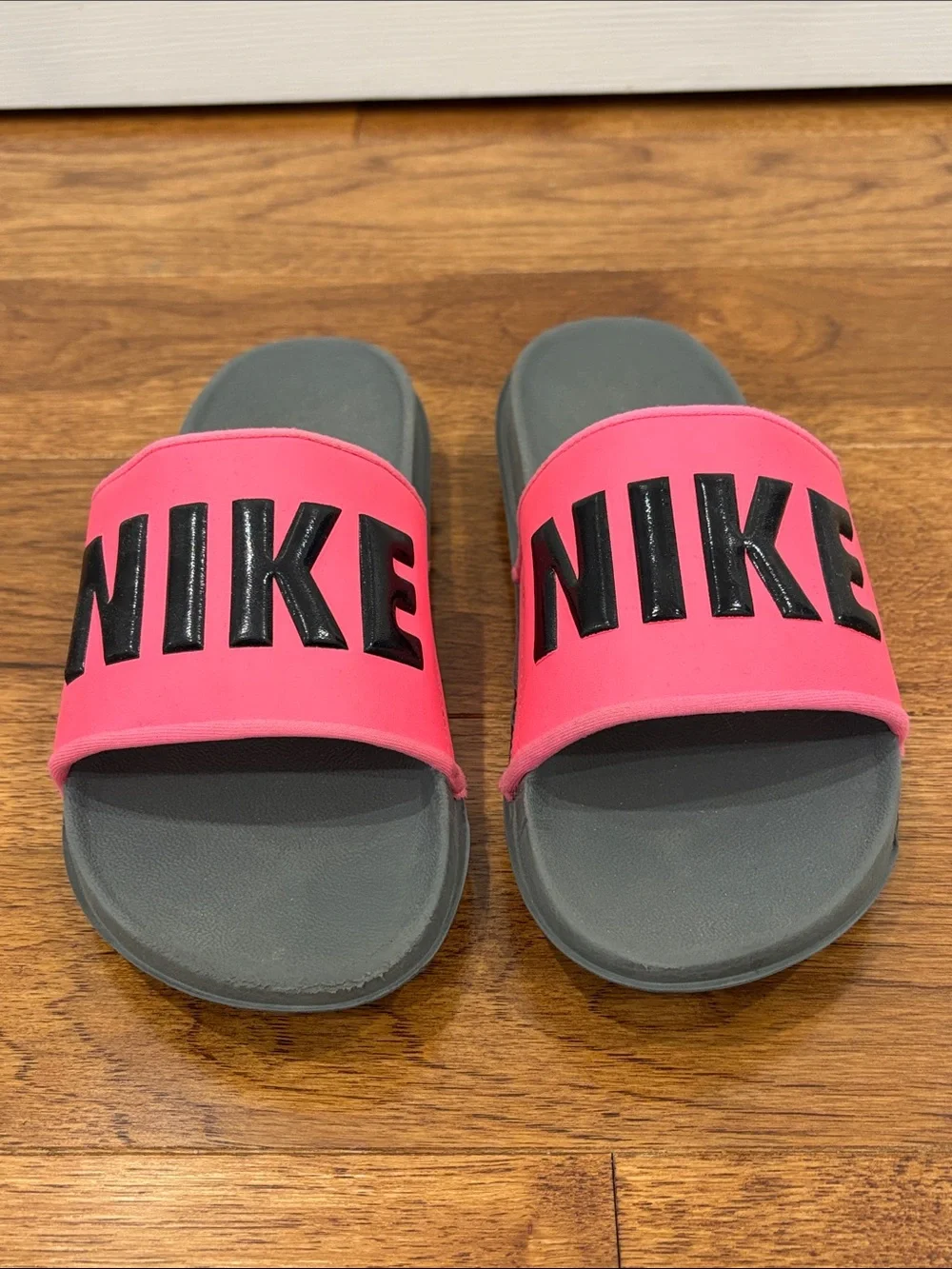 Nike Women’s Pink and Gray Slide Sandals with Bold Logo
